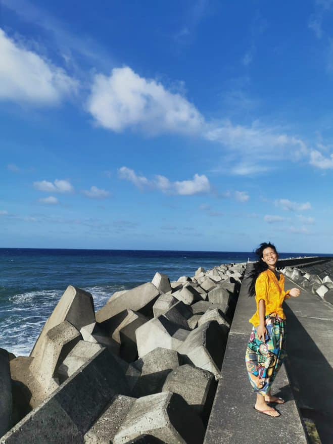 Laughing beside the sea